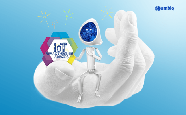 Scotty sitting on hand with IoT Breakthrough Awards