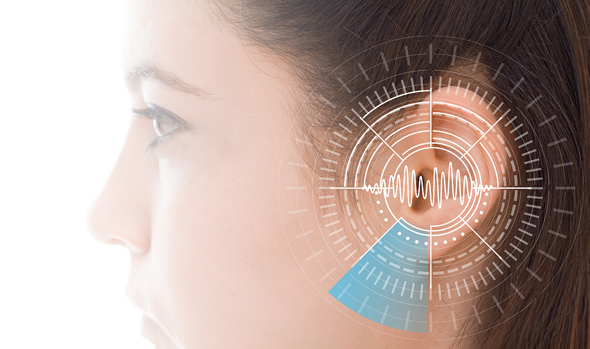 Hearing test showing ear of young woman