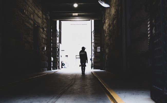 Security Guard patrolling tunnel