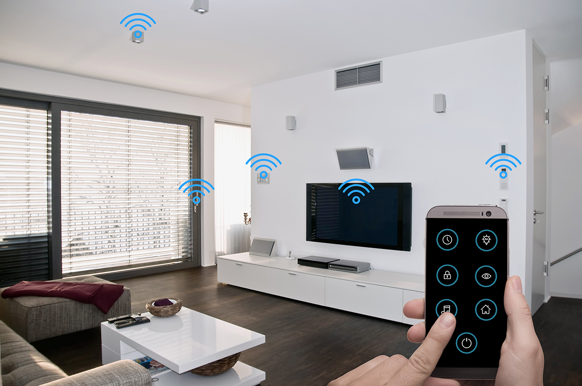 modern smarthome living room controlled by man holding a smartphone