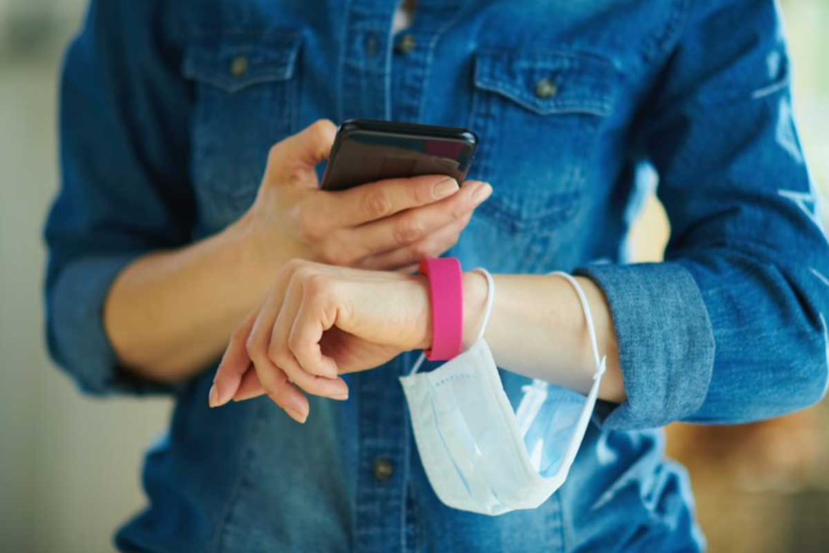 Woman monitoring health tracker