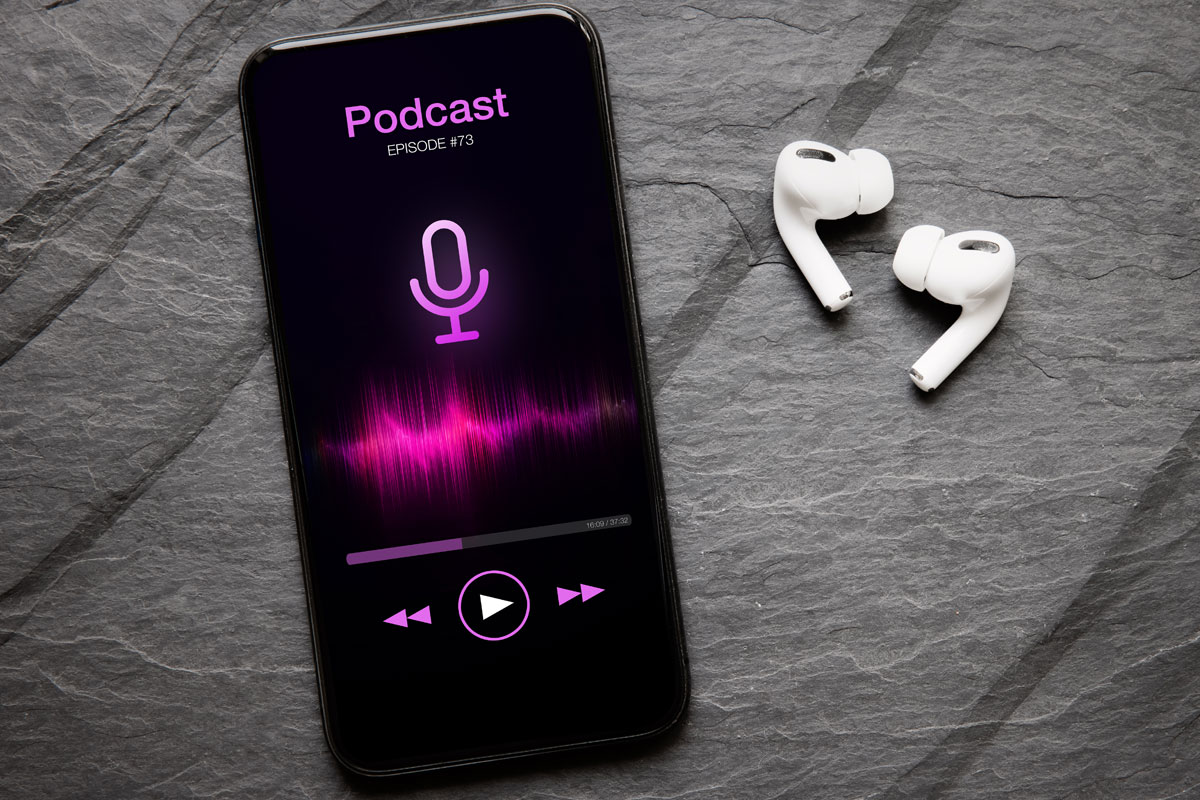 Podcast on mobile with earbuds