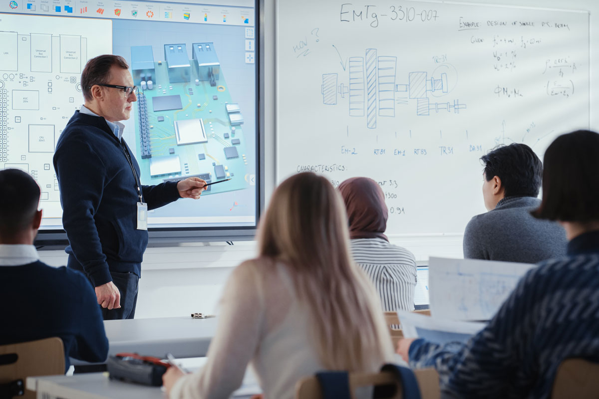 Professor teaching engineering students