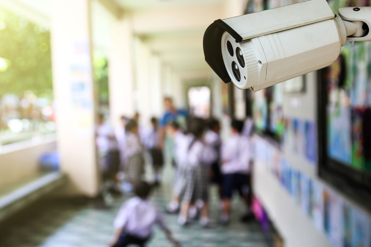 Security camera overseeing children during recess